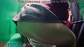 in a secretive booth, the young student encountered an anonymous encounter through the gloryhole, nervously exploring her first time with curiosity and hesitation