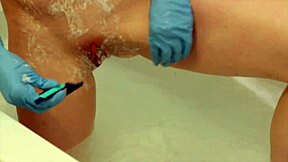 feel these rubber gloves on my shaved pussy lips while i shave everything smooth