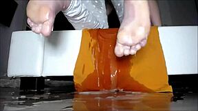 In this homemade video, a cute teen experiences squirting orgasm while masturbating solo in the bathtub for her partner