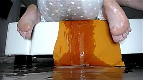 In this homemade video, a cute teen experiences squirting orgasm while masturbating solo in the bathtub for her partner