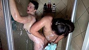Watch these mature and young lesbians lick pussies in a soapy shower! They kiss and orgasm together!