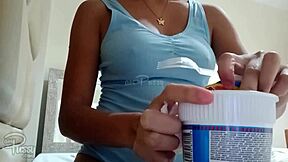 young asian girl feels so content and relaxed while enjoying her instant noodles at home