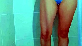 College beauty's Brazilian thong shower tease shows shaved pussy and big ass in homemade video