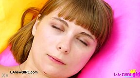 Attractive young woman poses to display her elegant figure during a casual photoshoot session