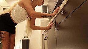 Hey hot tattooed blonde with long hair, why are you taking off your panties in the kitchen to show that meaty pussy and sexy ass?