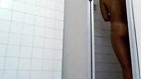 real couple enjoys wet bathroom shower together at home.