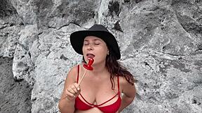 Stepmom practices sucking candy on the beach then emotionally tries skills on stepson's dick