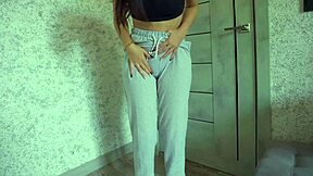 Amateur Curvy Babe In Jeans And Panties Experiences Desperation Pee On Sweatpants During Gym Workout