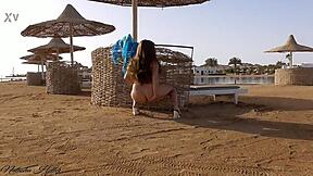 i'm flashing my cute blonde ass without panties on this public beach