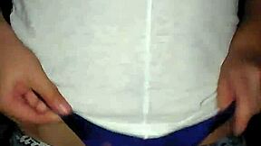 Lydia appears innocent in her teen style. She poses casually wearing a simple tanguita outfit for the scene.