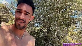 muscular stud strokes huge cock naked on public trail