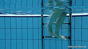 Hey blackhaired Aneta strips bikini pool underwater nudist fun