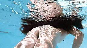 Skinny Hungarian teen Lana swims pool underwater showing juicy ass and small tits