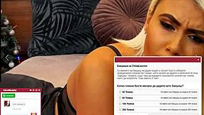 that blonde whore moans loud while fingering her shaved pussy on cam