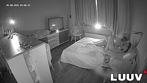 young couple fucks missionary style in bed at dawn