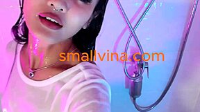 Damn, this super hot Asian teen in panties smokes and teases small tits!