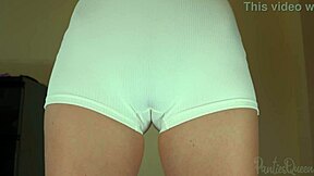 stepsister slips into tight shorts and flashes her huge hairy pussy in changing room