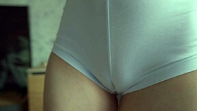 curvy teen's juicy cameltoe pussy lips peek from tight shorts