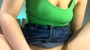 Vibrator buzzes deep as she fingers dripping pussy close-up