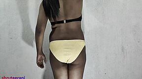 Indian shemale crossdresses in lime bikini for solo ass play