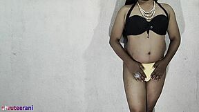 Indian shemale crossdresses in lime bikini for solo ass play